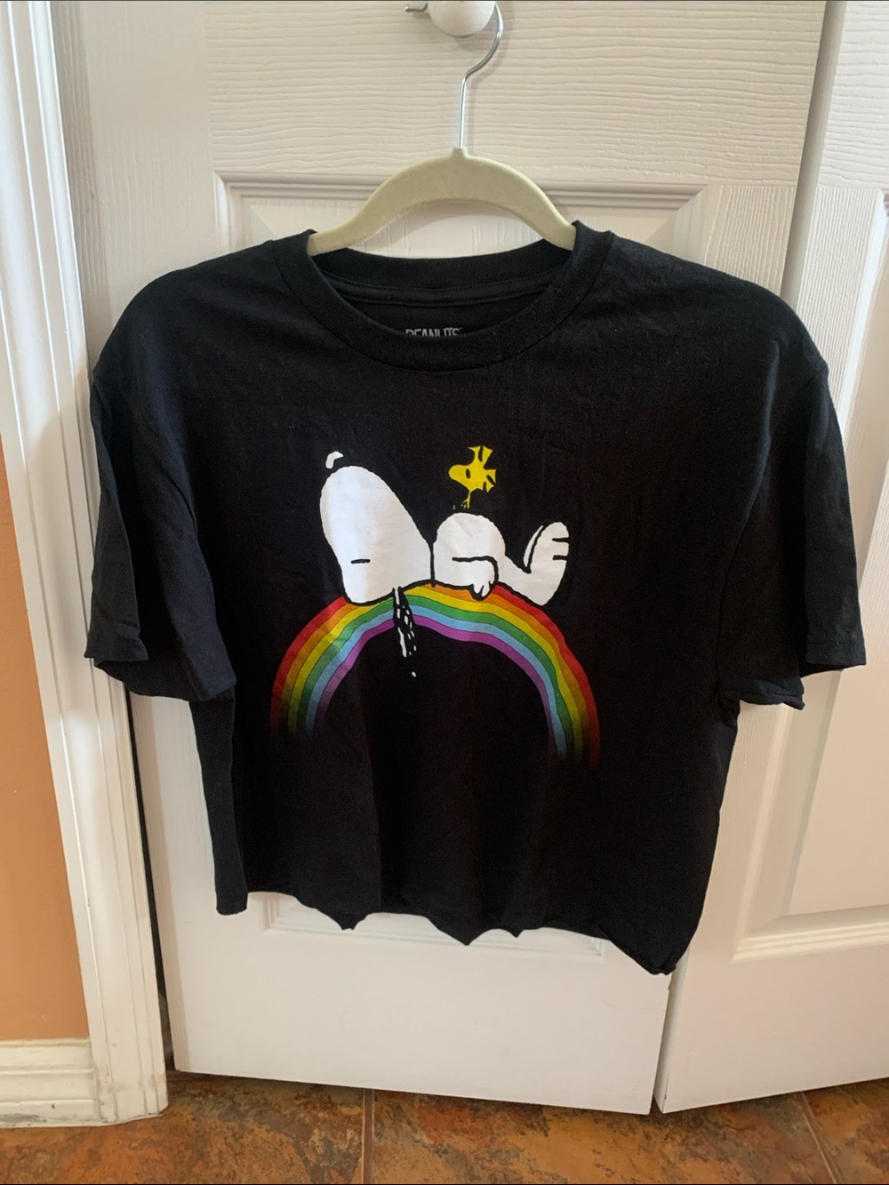 Peanuts Cropped Black Tee with Snoopy & Rainbow Graphic